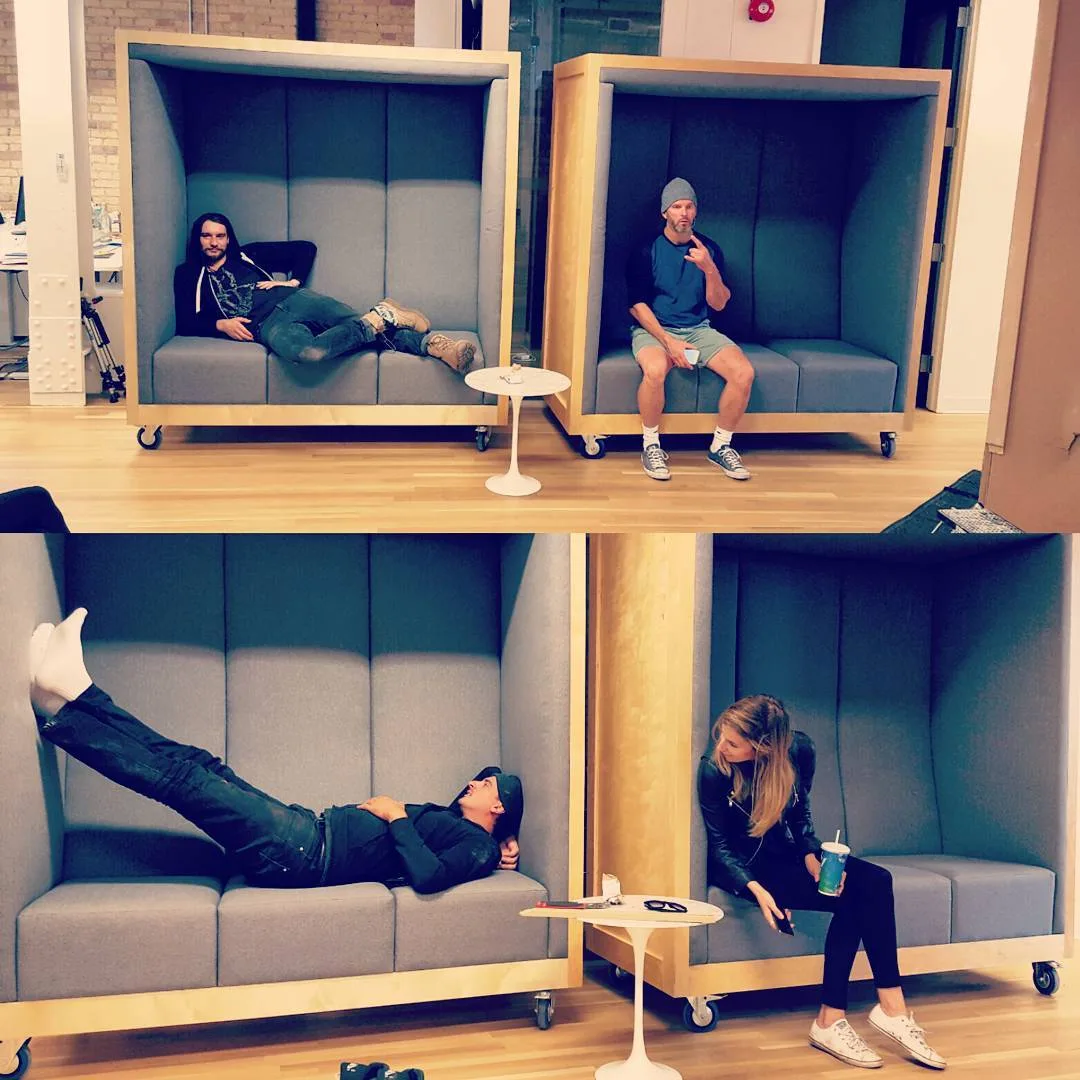 The team relaxing at the studio